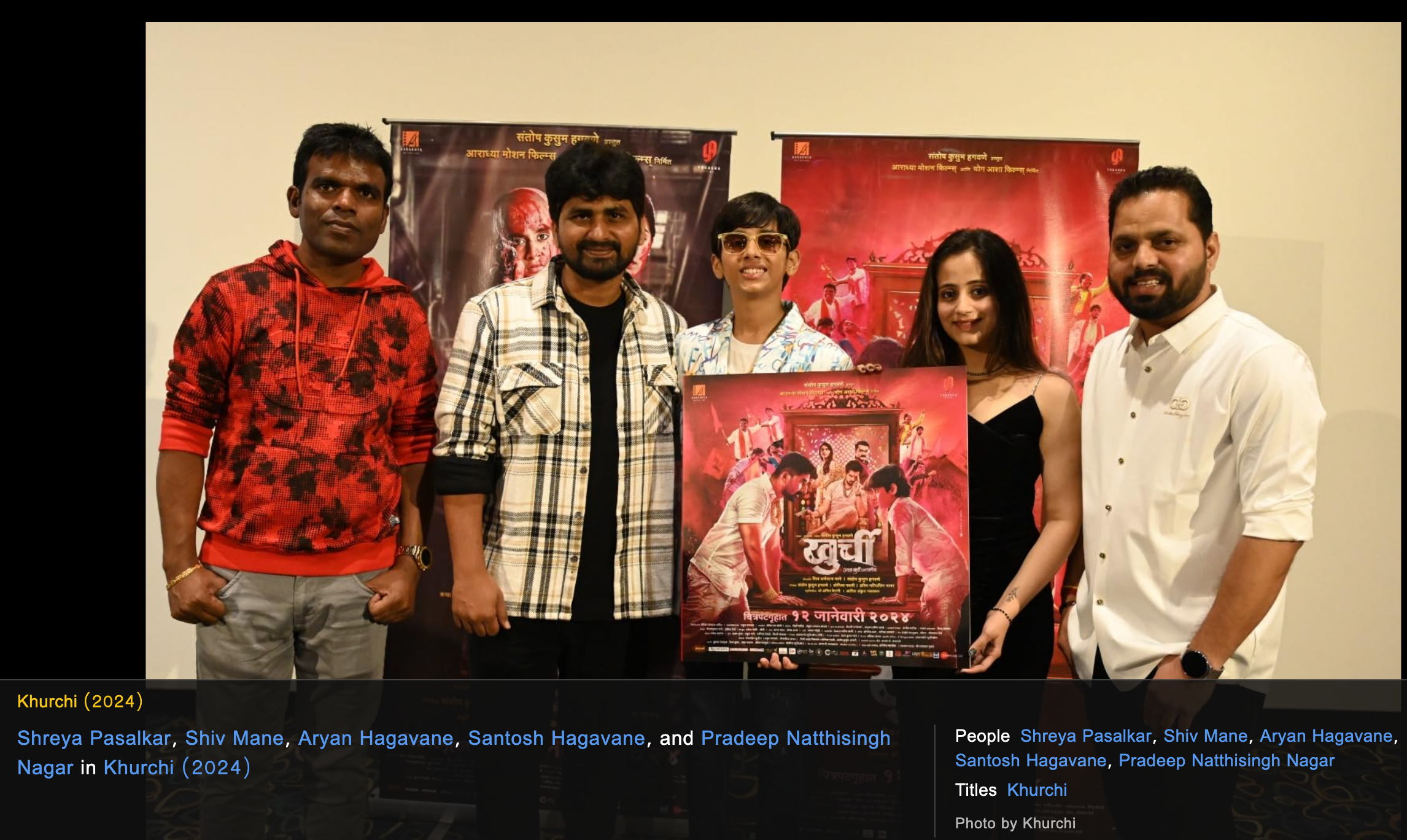 Khurchi team with movie poster
