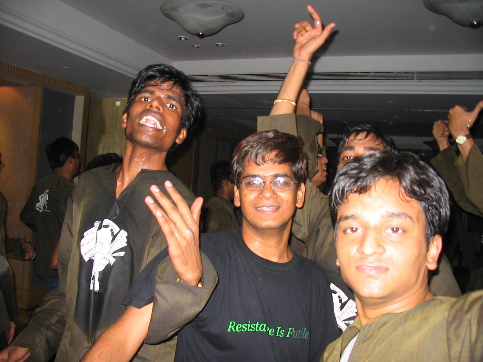 College friends gathered together at an indoor celebration