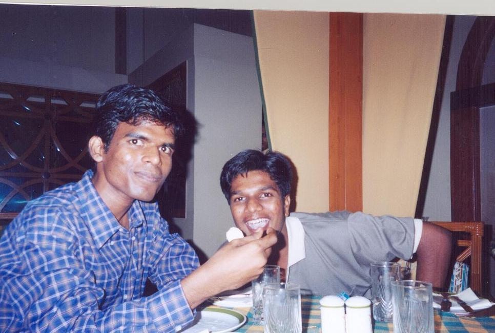 Two college friends sharing a meal together