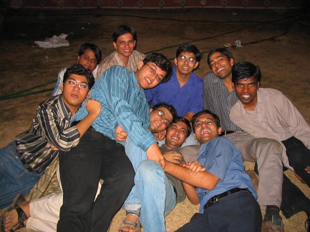 A group of IIT Bombay friends gathered together outdoors