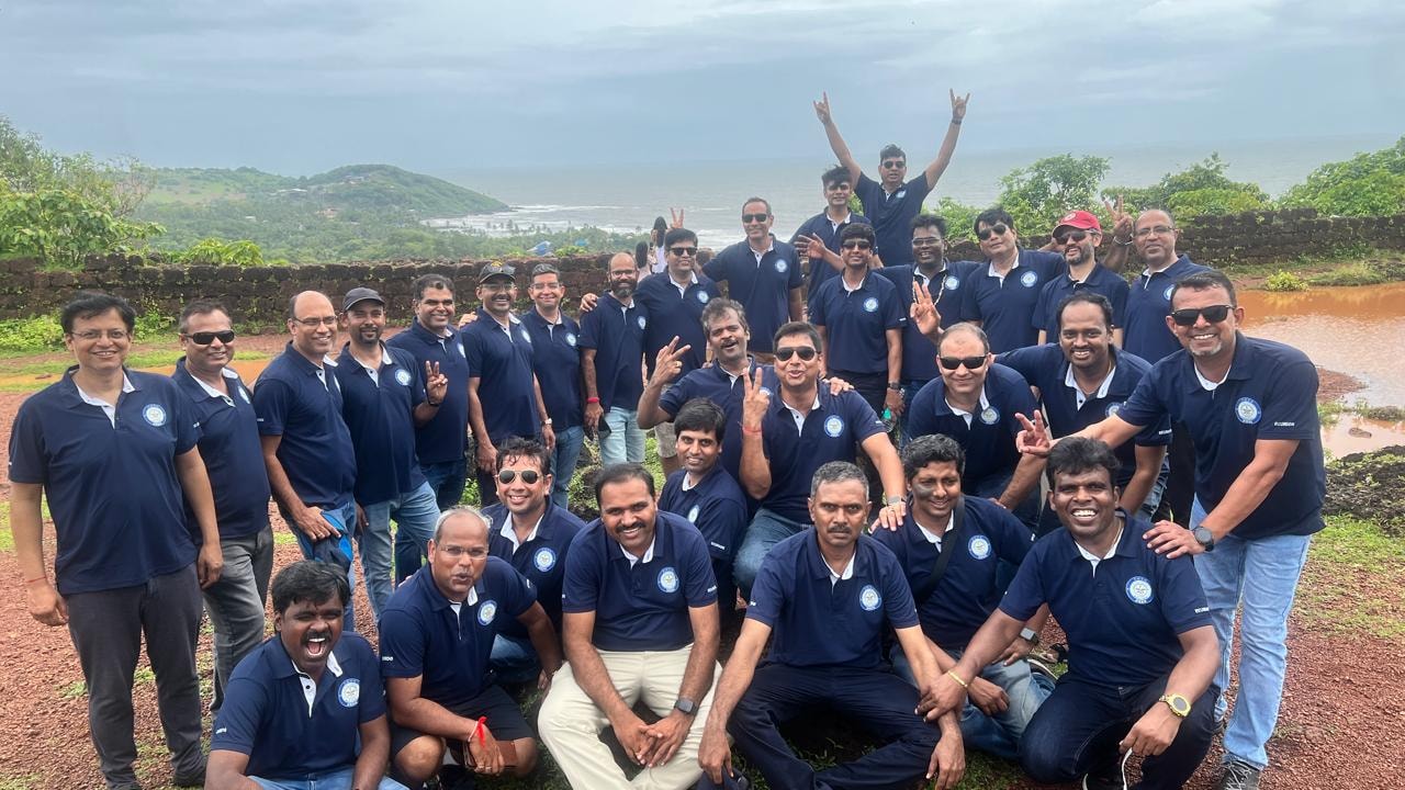 DRDO batchmates at a coastal viewpoint