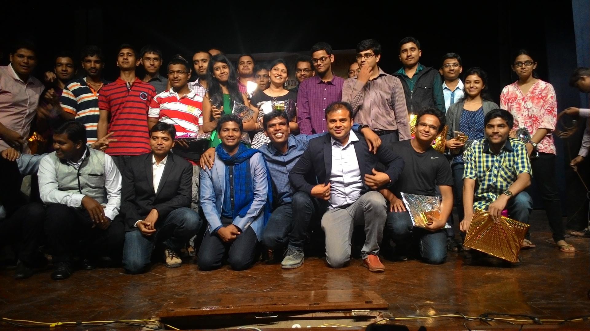 Prime Academy students and teachers at a farewell celebration on stage