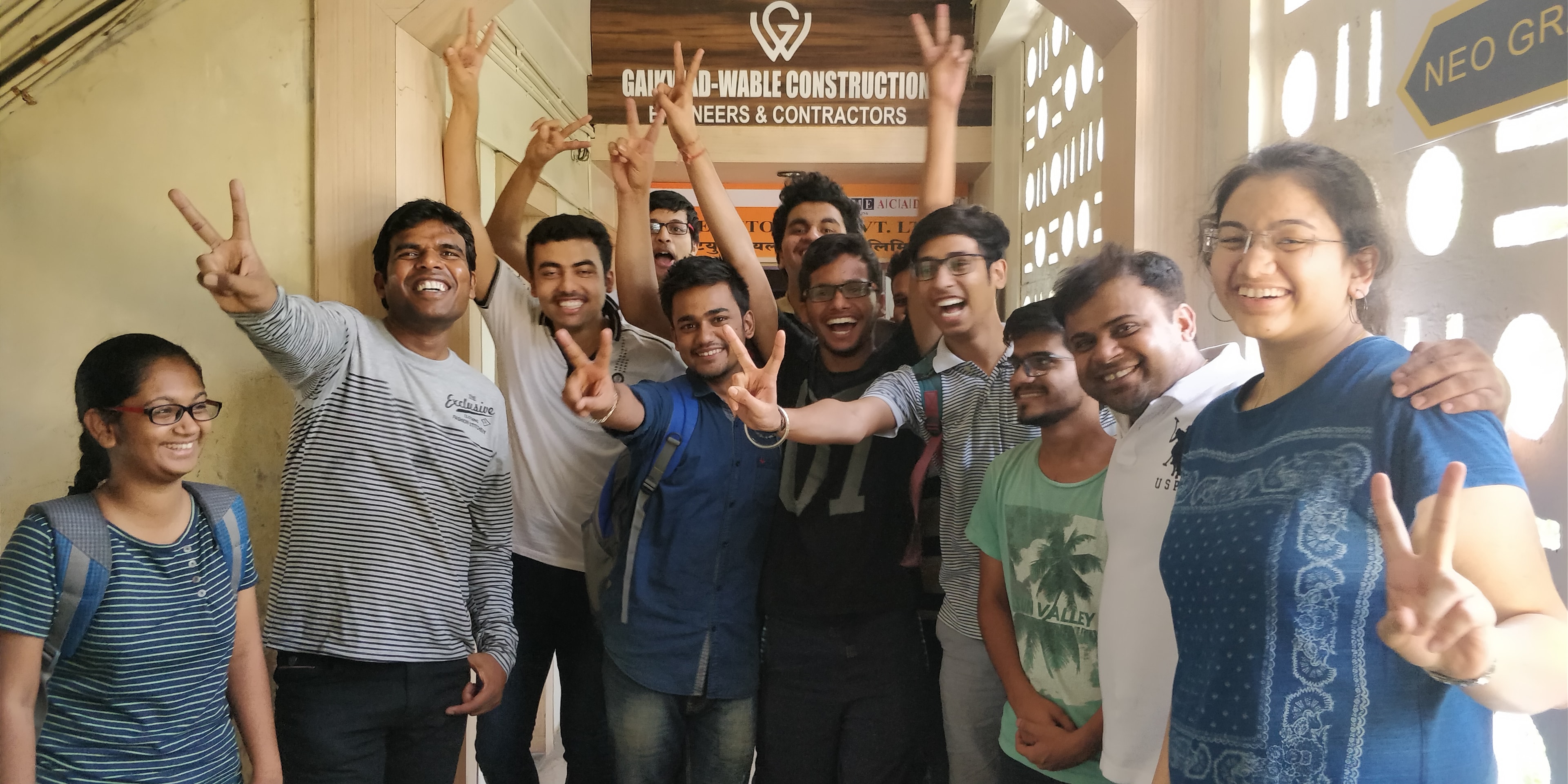 Students celebrating together with their mentors