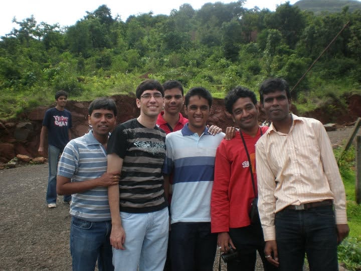 Friends together in a lush wooded setting
